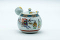 Tezumi — Japanese Tea Set - Villager Decorated Kutani-yaki Kyusu Teapot with 3 Lidded Yunomi Teacups — the cups viewed from above