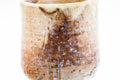 Close-up of the cup's surface highlighting the mottled white Hagi glaze