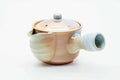 Pink-beige drip-glazed Hagi-yaki kyusu, side profile with the spout to the left
