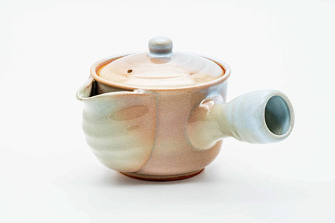 Pink-beige drip-glazed Hagi-yaki kyusu, side profile with the spout to the left