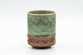 Japanese Teacup - Celadon Glazed Obori Soma-yaki Yunomi - 100ml - front view showing the celadon glaze with crazing and floral decoration