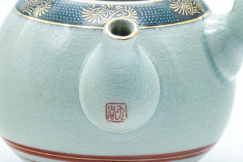 Tezumi — Japanese Tea Set - Villager Decorated Kutani-yaki Kyusu Teapot with 3 Lidded Yunomi Teacups — closeup of the decoration