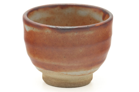 Tezumi — Japanese Teacup - Orange Shino Glazed Yunomi - 75ml — tipped to show the interior