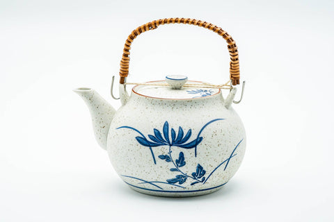 Japanese Dobin - Blue Floral White Textured Arita-yaki Porcelain Teapot - 500ml - side view showing the blue floral decoration