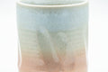 Tezumi — Japanese Teacup - Carved Beige Peach Glazed Hagi-yaki Yunomi - 200ml — tipped to show the interior