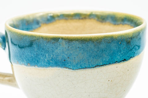 Tezumi — Japanese Teacup - Blue Drip-Glazed Agano-yaki Ushirode Yunomi - 140ml — tipped to show the interior