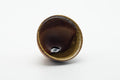 Tezumi — Japanese Teacup - Brown Green Ash Glazed Shigaraki-yaki Yunomi - 110ml — three-quarter view