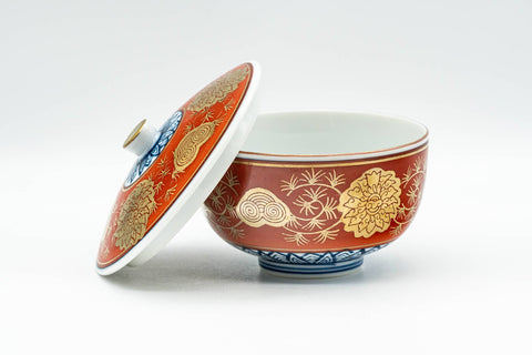 Japanese Teacup - Red, Blue, and Gold Floral Geometric Arita-yaki Lidded Yunomi - 160ml - angled view with the lid propped against the cup