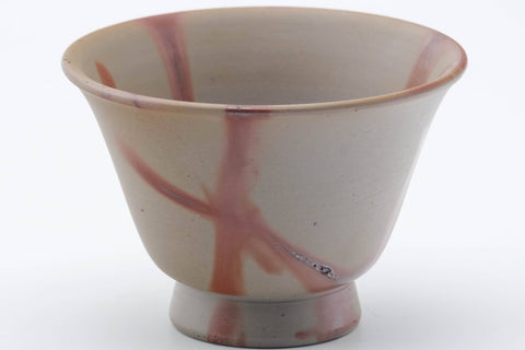 Tezumi — Japanese Teacup - Orange Hidasuki Rice Straw Bizen-yaki Yunomi - 160ml — tipped to show the interior