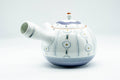 Opposite side view of the striped Arita teapot