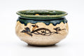 Front view of the Oribe-yaki kensui with green glaze rim and brushed motifs on beige clay