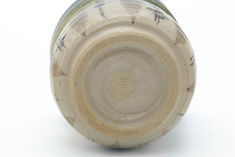 Tezumi — Japanese Teacups - Pair of Floral Oribe-yaki Meoto Yunomi - 150ml — tipped to show the interior