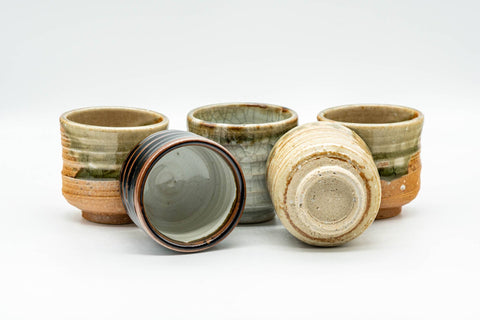 Japanese Tea Set - Set of 5 Uniquely Glazed Shigaraki-yaki Guinomi - 50ml - the five teacups grouped, some tilted to show interiors and bases