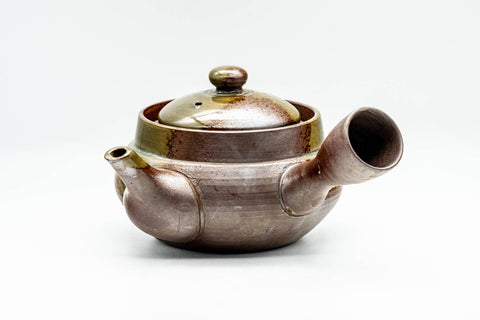 Front view with the lid seated, displaying the metallic ash-glaze surface.