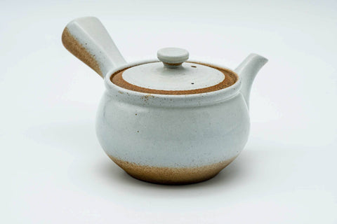 Rear three-quarter view of the white kyusu showing the side handle.