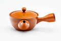 Front view of the wide red kyusu showing the spout, lid on.