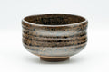 Japanese Matcha Bowl - Brown and Yellow Glazed Waisted Chawan - 450ml - side view showing the waisted spiral ridges