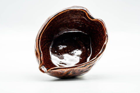 Overhead view into the katakuchi revealing the glossy burgundy glazed interior