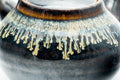 Close-up of the hare's-fur drip-glaze texture on the body.