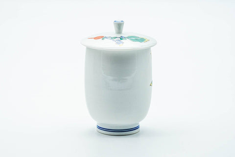 The lidded cup from the reverse, showing the plain side and blue rim line.