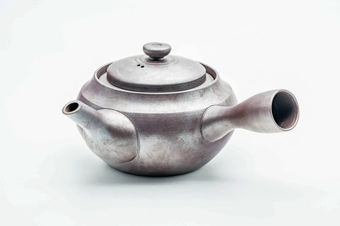 Rear three-quarter view of the large kyusu showing the handle.