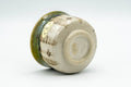 Japanese Teacup - Floral Green Drip-Glazed Oribe-yaki Guinomi - 50ml - tilted view showing the unglazed foot
