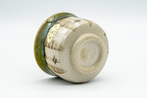 Japanese Teacup - Floral Green Drip-Glazed Oribe-yaki Guinomi - 50ml - tilted view showing the unglazed foot