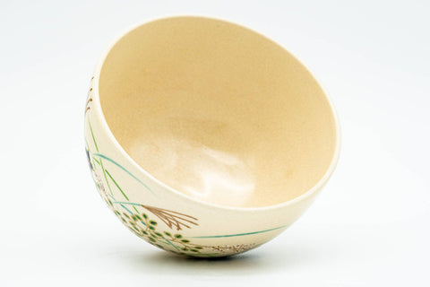 Japanese Matcha Bowl - Akatsuki Kiln - Beige Floral Kyo-yaki Chawan in Wooden Box - 300ml - tilted view showing the underside and foot ring