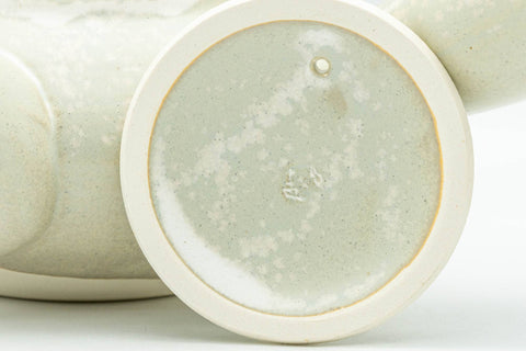 Tezumi — Japanese Kyusu - Beige Foliage Kiyomizu-yaki Debeso Teapot - 300ml — closeup of the base