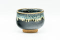 Japanese Teacup - Jet Black Beige Drip-Glazed Guinomi - 40ml - side view showing the beige drip glaze
