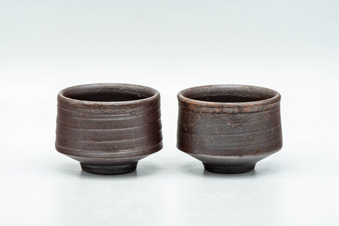Tezumi — Japanese Teacups - Pair of Brown Spiraling Stoneware Guinomi - 40ml — front view from another angle