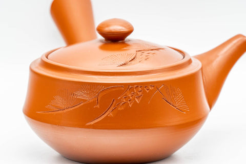 Tezumi — Japanese Kyusu - Engraved Red Shudei Tokoname-yaki Debeso Teapot - 210ml — closeup of the decoration