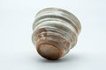 Tezumi — Japanese Teacup - Beige Cream Spotted Spiraling Yunomi - 220ml — top-down view of the interior