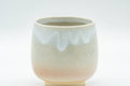 Japanese Teacups - Set of 4 Tsubaki Kiln Hagi-yaki Yunomi - 90ml - closeup of a single teacup showing the beige and white drip glaze
