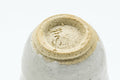 Tezumi — Japanese Teacup - White Drip-Glazed Guinomi - 40ml — inverted showing the foot ring