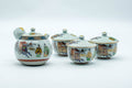 Tezumi — Japanese Tea Set - Villager Decorated Kutani-yaki Kyusu Teapot with 3 Lidded Yunomi Teacups — the full set arranged together