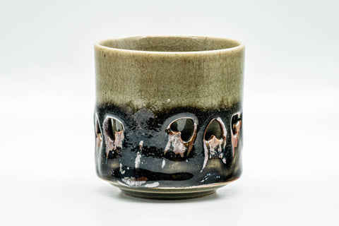 Three-quarter view of the Obori Soma yunomi showing the crazed celadon glaze and decorative band