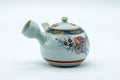 Tezumi — Japanese Tea Set - Villager Decorated Kutani-yaki Kyusu Teapot with 3 Lidded Yunomi Teacups — the cups grouped together