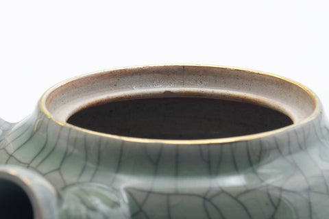 Tezumi — Japanese Kyusu - Golden Horse Green Celadon Glazed Obori Soma-yaki Porcelain Teapot - 200ml — side profile showing the spout and handle