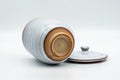 Tezumi — Japanese Teacup - Large White Glazed Hagi-yaki Lidded Yunomi - 220ml — tipped to show the interior