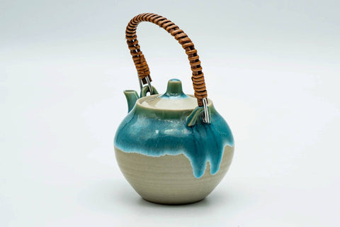 Turquoise Agano-yaki top-handled teapot, three-quarter view from the opposite side