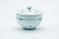 The lidded teacup, lid on, front view.
