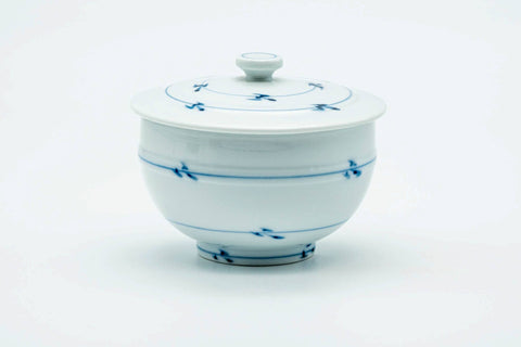 The lidded teacup, lid on, front view.