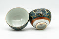 Japanese Teacups - Pair of Floral Aochibu Kutani-yaki Porcelain Yunomi - 80ml - two cups with one on its side showing the white interior