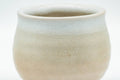 Tezumi — Japanese Teacup - Small Beige and White Hagi-yaki Ushirode Yunomi - 90ml — tipped to show the interior