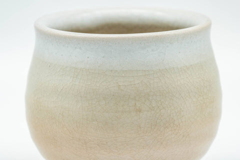 Tezumi — Japanese Teacup - Small Beige and White Hagi-yaki Ushirode Yunomi - 90ml — tipped to show the interior