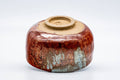 Tezumi — Japanese Matcha Bowl - Vibrant Red Oil Glazed Chawan - 250ml — tipped to show the interior