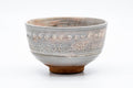 Japanese Matcha Bowl - Floral Grey Pink Mishima Glazed Chawan - 250ml - angled view showing the rim and a glimpse of the patterned interior