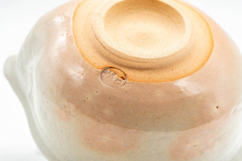 Japanese Tea Set - Hagi-yaki Katakuchi Water Cooler with 5 Guinomi Tea cups - closeup of the glazed interior base of the katakuchi