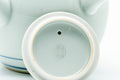 Japanese Kyusu - Blue Floral Porcelain Arita-yaki Ceramic Filter Teapot - 275ml - closeup of the underside showing the white porcelain foot